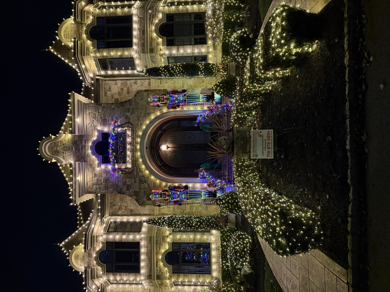 Château with a purple-lit arched entry